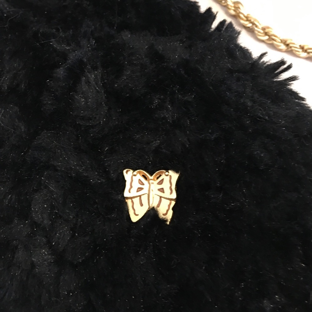 Vintage matte gold tone butterfly tac lapel pin